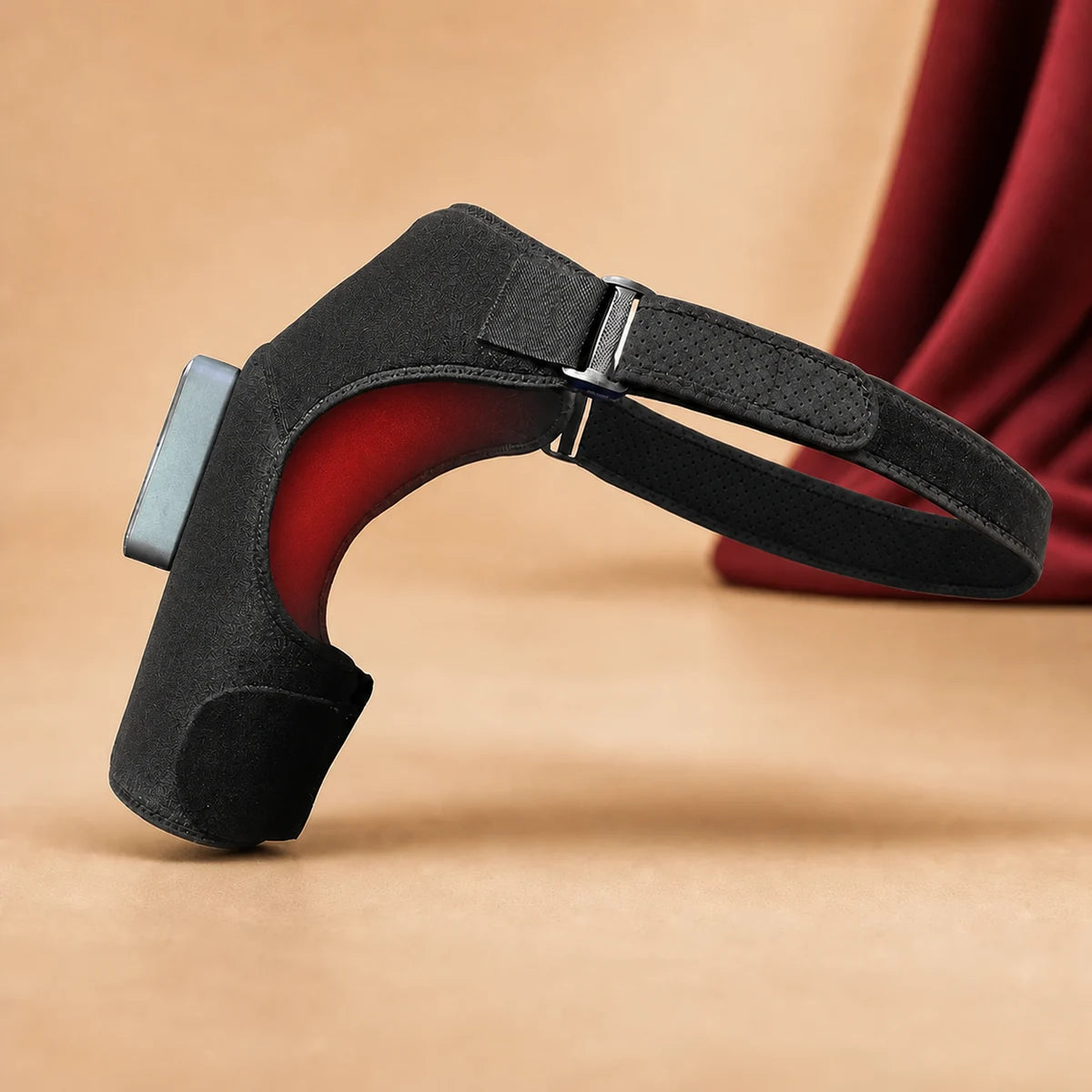 ThermoLuma Shoulder Wrap showing its shaped panel and internal light placement.